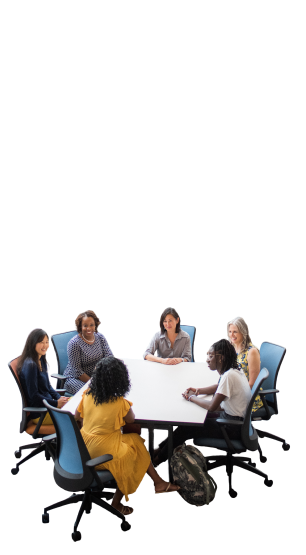 A group of women having a conversation around a table