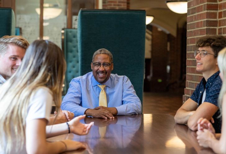 Martino Harmon speaking to students