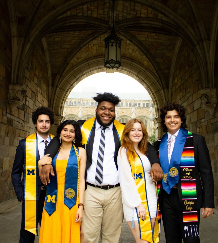 A group of graduates in the Law Quad